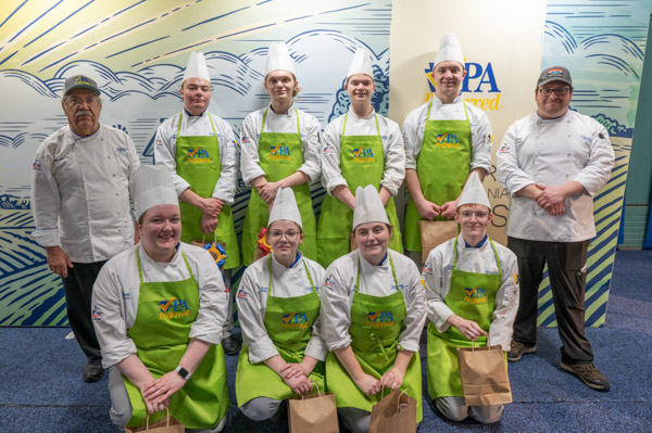 The Penn College Farm Show team: Front (from left) are M.J. Harbron, of Pottstown, baking & pastry arts; Autumn B. Stanley, of Chesapeake City, Md., baking & pastry arts; Kylie R. Landon, of Canton, culinary arts technology; and Noah W. Beck, of Port Matilda, culinary arts technology. Standing (from left) are Chef Michael J. Ditchfield, instructor of hospitality management/culinary arts; Luke C. Whipple, of Shamokin Dam, baking & pastry arts; Jordan S. Brouse, of Northumberland, culinary arts technology; Daniel S. Gray, of Millheim, culinary arts technology; Jared D. Schwenk, of New Ringgold, culinary arts technology; and Chef Mike S. Dinan, interim sous chef for the college’s Le Jeune Chef Restaurant. Also on the team was Laney E. Heller, of Cogan Station, applied management (Class of 2021, baking & pastry arts).