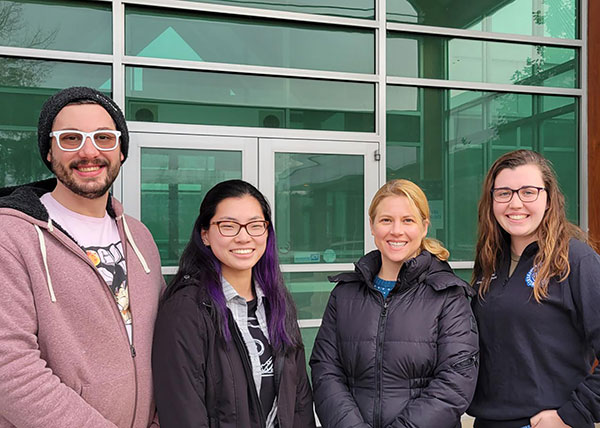 Four 2022-23 recipients of PLNA Foundation scholarships gather outside Pennsylvania College of Technology's Schneebeli Earth Science Center. From left are landscape/plant production technology students Ian A. Folsom, of Williamsport; Grace E. Maneval, of Montgomery; Erin S. Carey, of Lewisburg; and Sophia G. Wiest, of Butler. (Photo by Carl J. Bower Jr.)
