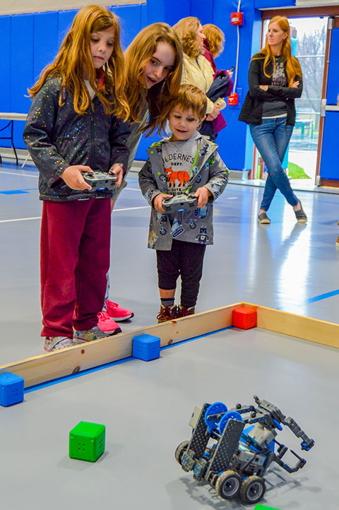 Children at the 2022 Science Festival try their hand at maneuvering robots from VEX Robotics. The 2023 event is scheduled for Thursday, Feb. 16, in the Field House at Pennsylvania College of Technology.