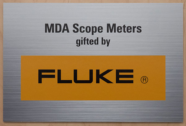 A wall sign acknowledges the Fluke Corp.'s equipment donation.