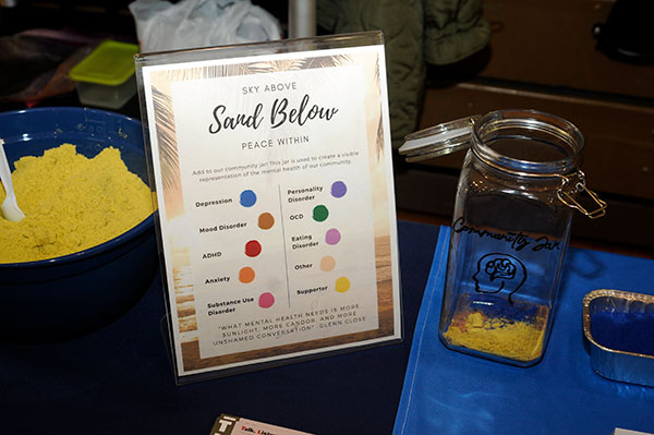 Ackels also started a Community Jar of color-coded sand, laying down a layer of supportive yellow that pledged the campus' compassionate response to whatever followed.