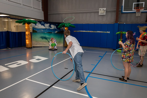 Hula hoops, aptly named for this tropical paradise, are put to use in a ring-toss game.<br />
