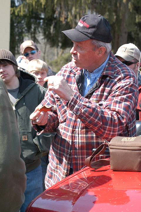 Nibert in his element − an outdoor wildlife lab − instructing students during a pheasant release onto State Game Lands in March 2005.
