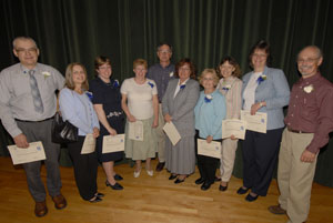 The newest members of the college's Quarter Century Club include, from left, Tom Livingstone, Ruth E. Hameetman, Jenny M. Maurer, Judy L. Phillips, Steve T. McDonald, Judy A. Fink, Connie L. Hull, Adelle M. Dotzel, Glenda D. Ferguson and Bruce M. Smith.