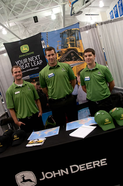 Welding and fabrication engineering technology grads Jacob D. Fisher ('10, center) and Timothy J. Schanken ('06, right) join John Deere co-worker Steven Hart.
