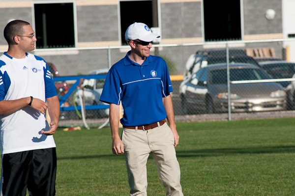 Golf coach Matt Haile, in shades and Wildcat blue