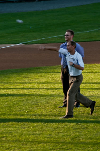 Scott E. Kennell, Penn College's director of athletics, shows winning form in the ceremonial first pitch.