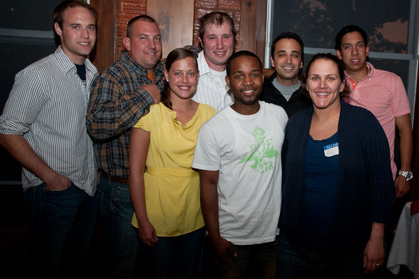 Wildcat soccer alums, including men's coach Enrique Castillo at right, reunite for Homecoming.