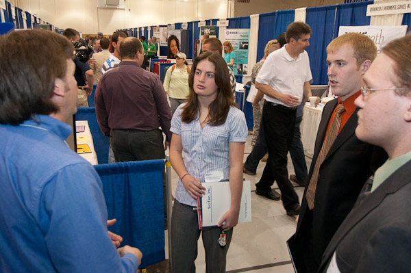 Jorgette N. Grosso, center, a senior in electronics and computer engineering technology from Boonton, N.J., listens intently to advice.