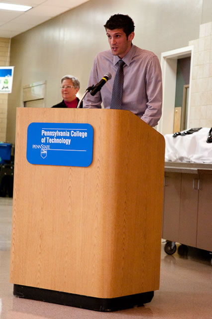 Student speaker Jonathan M. Norton, of Lebanon, a junior in physician assistant and recipient of the Labels by Pulizzi Scholarship, shares his appreciation before an audience that includes Penn College President Davie Jane Gilmour.