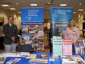 Steven K. McCoy and Stacey C. Hampton explain Penn College's construction management and civil engineering technology majors at the Frederick ACE College Fair in Maryland.