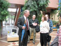 Penn College's Senior Vice President William J. Martin talks with Road Scholars in ATHS lobby