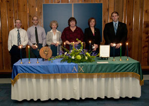 Alpha Chi members attending the induction ceremony stand for a group photo