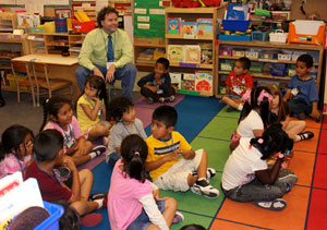 Gerald D. %E2%80%9CChip%E2%80%9D Baumgardner, associate professor of business administration (and Alpha Chi faculty sponsor) at Pennsylvania College of Technology, visits San Diego%E2%80%99s Jefferson Elementary School as part of a Reading Is Fundamental delegation. (Photo by Bill Clemente, professor of English at Nebraska%E2%80%99s Peru State College)