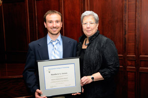 Matthew L. Gross, of Boulder, Colo., Alumni Achievement Award recipient, and President Gilmour