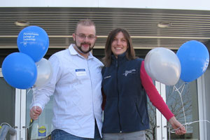 Alumnus Larry J. Morgan and Becky J. Shaner, alumni relations assistant at Pennsylvania College of Technology, cheerfully welcome Open House guests to College Avenue Labs.