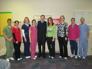 Several alumni (joined by clinic dentist Tom Klena, center) returned to campus to volunteer for Sealant Saturday. (Photo by Barbara K. Emert-Baldwin, dental hygiene instructor)