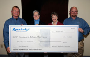 Anadarko Petroleum Corporation representatives presented a check to Pennsylvania College of Technology to support training initiatives for workers in the natural gas industry. From left, Michael J. Beattie, Anadarko geoscience manager Appalachia exploration%3B Davie Jane Gilmour, president of Penn College%3B Mary B. Wolf, government relations consultant to Anadarko%3B and Scott J. McNamara, Anadarko project land advisor.