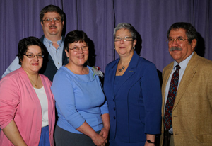 Joining President Davie Jane Gilmour in honoring Ann Seeley, second from left, are nominators Mary Trometter, left%3B Paul Mach, rear%3B and Michael Ditchfield.