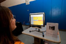 Student Ashley M. Stuck 'types' on a hands-free keyboard, calibrated to operate by eye movement alone