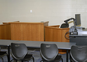 A mock courtroom %E2%80%93 complete with jury box, judge's bench and witness stand %E2%80%93 adds workplace realism for the school's paralegal%2Flegal assistant majors.