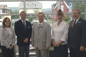Representing the various offices that comprise Penn College's new Center for Business %26 Workforce Development, are, from left, Katie C. Bell, Keystone Innovation Zone coordinator%3B James K. Shillenn, IMC executive director%2FCEO%3B Lawrence J. Fryda, dean of industrial and engineering technologies%3B Sue Greene, client development manager for Penn State Continuing Education at Williamsport%3B and Larry L. Michael, executive director, workforce and economic development.