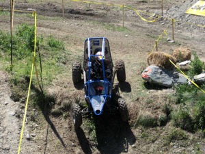 One of two Pennsylvania College of Technology entries in the Society of Automotive Engineers %E2%80%9CBaja SAE Montreal%E2%80%9D tackles rough terrain during a four-hour endurance race, the final event of the collegiate competition.
