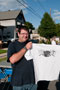 Student Brad Foster displays an event T-shirt