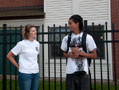 Katie Mackey, coordinator of off-campus student housing, talks with off-campus resident Giordano Reynoso 
