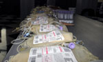 Unfilled bags await always-needed blood donors