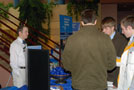 Bradley M. Webb, coordinator of matriculation and retention for Penn College's School of Business and Computer Technologies, staffs an information table in the Advanced Technology and Health Sciences Center atrium