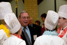 Scholarship donor George Girio talks with students
