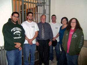 Members of the Penn College student organization Collegiate Association for County Correctional Education donated textbooks to the Northumberland County Prison. From left are Moshe Betancourt, vice president%3B Anthony McGinley, treasurer%3B Roy Johnson, Northumberland County Prison warden%3B Brandon Close, president%3B and organization members Ammie Zarzyczny and Katina Lewis.