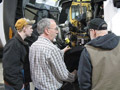 Students eye the CT660 with David C. Johnson, instructor of diesel equipment technology