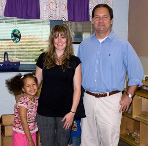 U.S. Rep. Christopher P. Carney greets May 2009 Pennsylvania College of Technology graduate Anne E. Boerckel, mother of 4-year-old Cristina Trice, at the college%E2%80%99s Children%E2%80%99s Learning Center. Boerckel benefited from CCAMPIS grant funding when she was a student, and her daughter continues to attend the Children%E2%80%99s Learning Center.