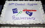 Hygienists' tools adorn commemorative cake