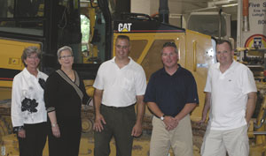 Acknowledging Caterpillar%E2%80%99s donation of a D-6K Dozer to Pennsylvania College of Technology are, from left, Lizabeth S. Mullens, Penn College%E2%80%99s vice president for academic affairs%2Fprovost%3B college President Davie Jane Gilmour%3B Tim Hinson, a technical communicator with the construction division of Cleveland Brothers Equipment Co., a Harrisburg-based Caterpillar dealer%3B Brett A. Reasner, the college%E2%80%99s assistant dean of natural resources management%3B and Mark F. Wilkinson, product support operations representative for Caterpillar%E2%80%99s Harrisburg District.