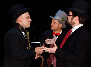 Scrooge is solicited by Jollygoode (Penn College employee Timothy J. Mallery, center) and Harty (2002 graduate Nicholas I. Buckman).