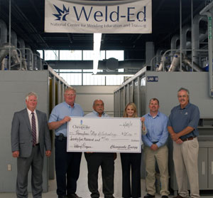 From left: Bill Meeks, coordinator of quality control training for Chesapeake Energy Corp.; Rich Wagoner, Chesapeake's quality assurance specialist for welding inspection; Donald O. Praster, Pennsylvania College of Technology's dean of industrial and engineering technologies; Jane Clements, coordinator of corporate development for Chesapeake; Jeffrey F. Lorson, director of workforce training at the Marcellus Shale Education & Training Center; and Tom Gregory, associate vice president for instruction at the college.