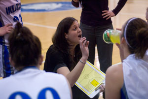 Lady Wildcats basketball coach Alison Tagliaferri talks with her players during a timeout against Penn State Brandywine.