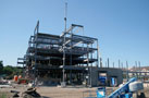 Structural steel and masonry work mark progress on the college's newest on-campus housing complex