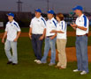 Daniel J. Wido, Shickshinny (left), threw out the first pitch, joined by his fellow All-American Wildcat archers - Zachary M. Plannick, Coraopolis; Brock J. Smith, Brookville; and Lindsey K. Fackler, Halifax; and (at right) Penn College archery coach Chad L. Karstetter