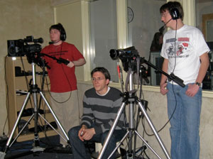 Penn College mass media communications students, from left, Jeremy L. Swiger, of Pine Grove%3B Seth H. Heasley, of Montgomery%3B and Jonathan R. Hurr, of Franklin, assist with video production of the 'Down by the Tool Shed' children%E2%80%99s music DVD.