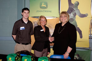 John Deere recruiters Timothy Schanken, a 2006 graduate of Pennsylvania College of Technology%E2%80%99s welding and fabrication engineering technology major, and Lisa Reitinger join Debra M. Miller, the college%E2%80%99s director of corporate relations (right) at the Spring Career Fair in the Bush Campus Center.