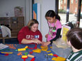 Student Kelly A. Hakes and friend have fun with crafts