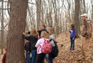 Students Lance E. Armstrong, Muncy (closest to tree) and Ryan E. Malone, Schuylkill Haven, explain the damage from invasive pests such as hemlock scale, the emerald ash borer and wooly adelgid