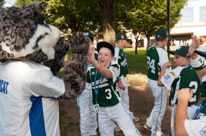 The Wildcat, Pennsylvania College of Technology%E2%80%99s mascot, greets members of the 2011 Little League Baseball World Series squad from New England (Cumberland, R.I.) during a picnic for the teams on the college%E2%80%99s main campus. Penn College was honored for its community outreach efforts during the series.