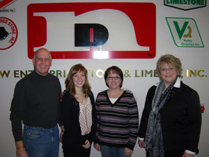 Gathering at the New Enterprise Stone %26 Lime Co. are, from left, Geoff Clark, vice president of construction%3B Michelle Edwards, Peg Edwards and Debra M. Miller, director of corporate relations at Penn College.