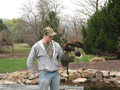 A Harris's Hawk perches on student Kyle A. Seyler, of Loganton, outside the Schneebeli Earth Science Center
