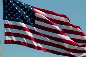 The large American flag outside the Student and Administrative Services Center offers a high-flying reminder of veterans' military service.
